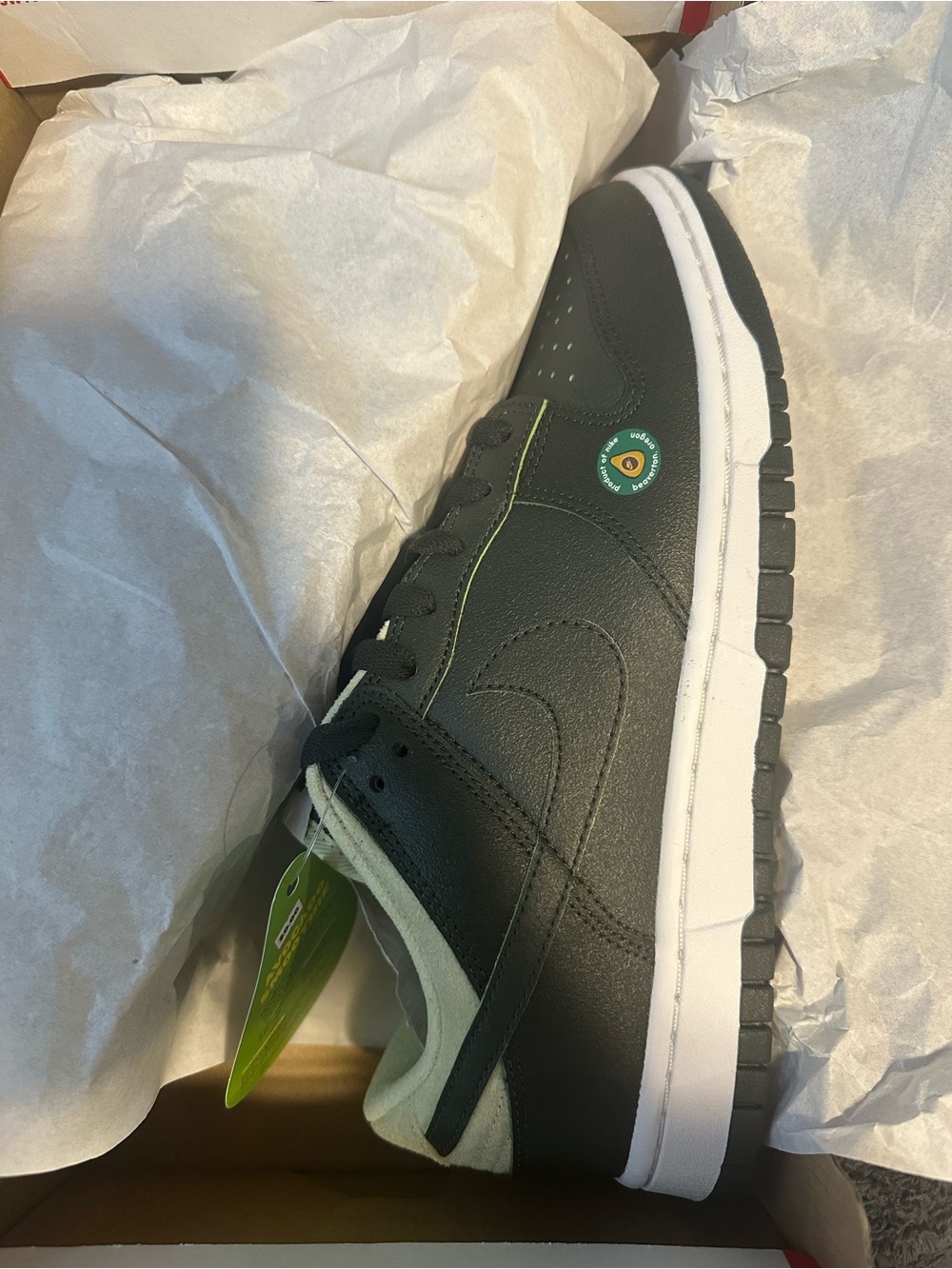 Nike Black Low-Top Sneakers with White Sole and Green Trim